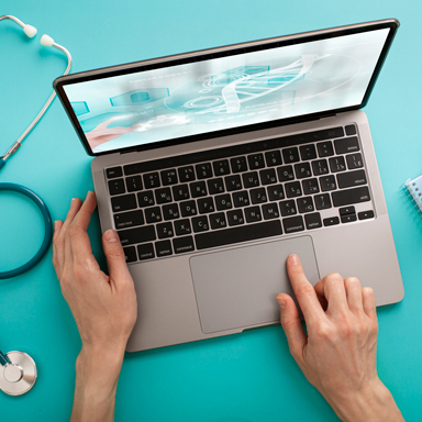 doctor s hand is typing data into system using laptop computerfemale hands medical white coat